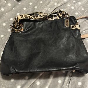 Sergio Ferretti Black handbag with leopard print details on handle and sides